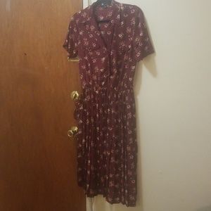 pleated maroon flowered dress.
